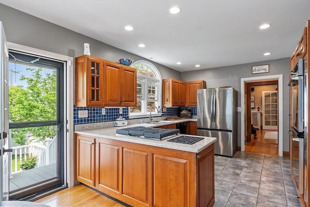 75 Hillcroft Ave, Worcester, MA 01606 - kitchen with appliances with stainless steel finishes, a sink, a peninsula, plenty of natural light, and recessed lighting