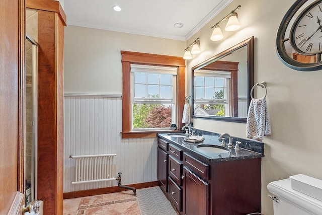 75 Hillcroft Ave, Worcester, MA 01606 - bathroom featuring toilet, ornamental molding, double vanity, wainscoting, and baseboards