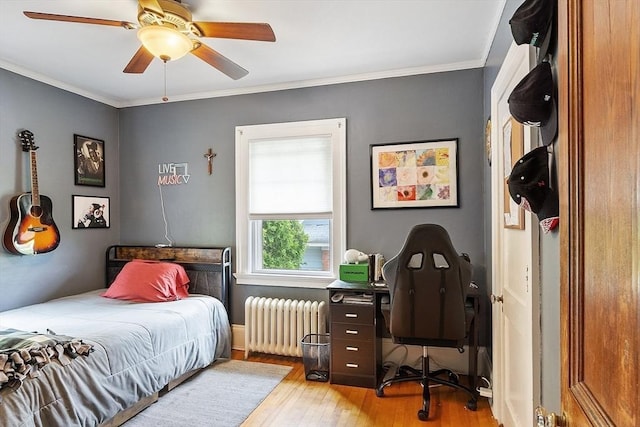 75 Hillcroft Ave, Worcester, MA 01606 - bedroom featuring radiator, wood finished floors, crown molding, and ceiling fan