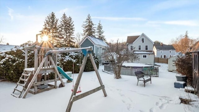 view of snow covered playground