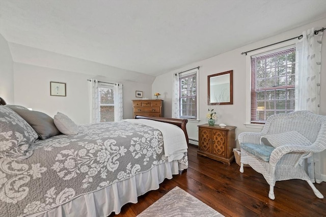 bedroom featuring a baseboard radiator and dark wood-type flooring