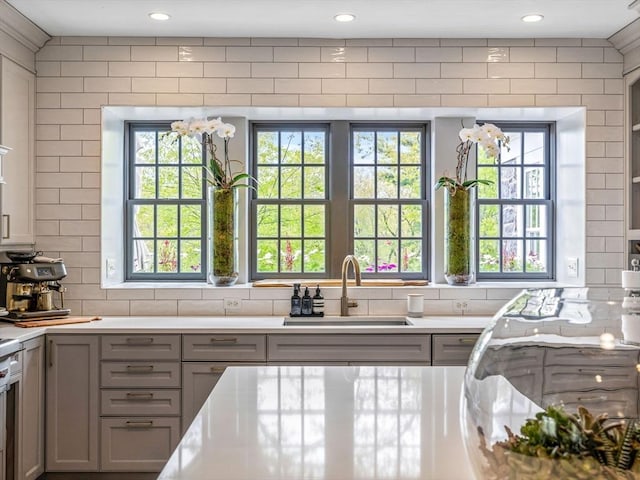 90 Burr Dr, Needham, MA 02492 - kitchen with gray cabinetry, light countertops, recessed lighting, and backsplash