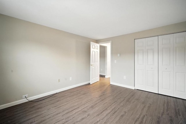 2 Maple Crest Cir Unit F, Holyoke, MA 01040 - unfurnished bedroom with wood finished floors and a closet