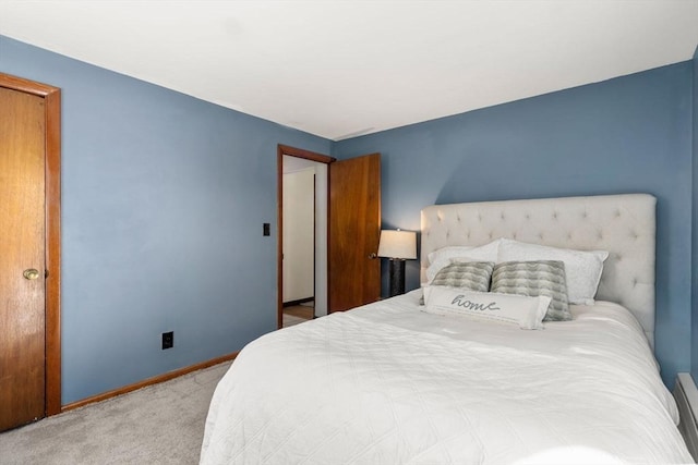 bedroom with light colored carpet