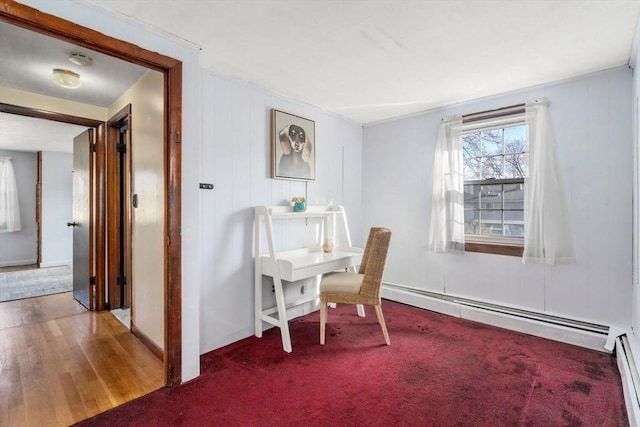 home office featuring wood-type flooring and baseboard heating