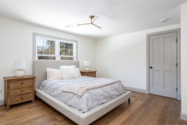 bedroom featuring hardwood / wood-style floors