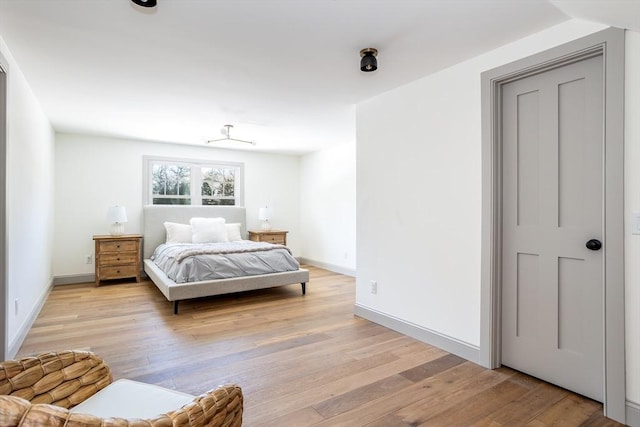 bedroom with light wood-type flooring