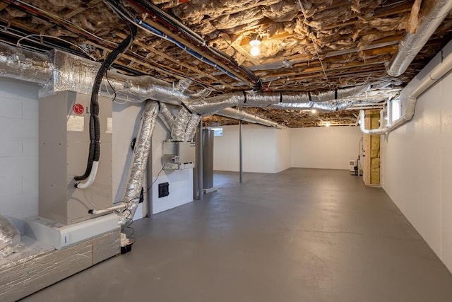 basement featuring heating unit