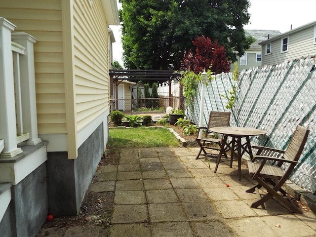 67 Gardner, Boston, MA 02132 - fenced backyard featuring a patio area and a pergola