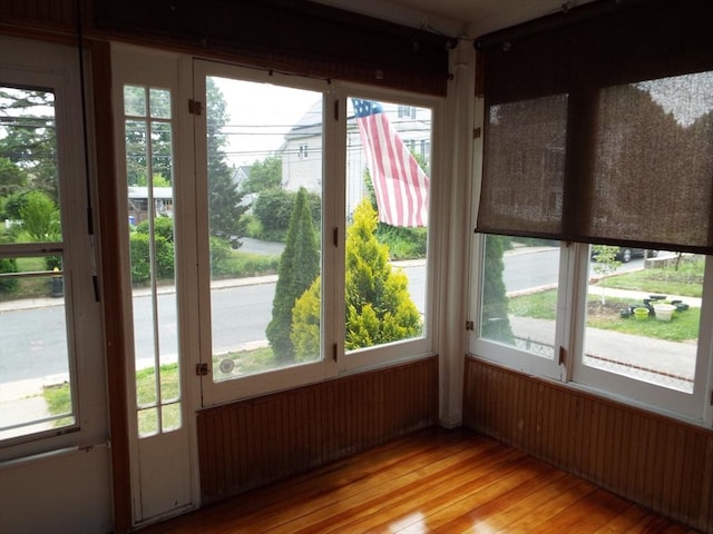 67 Gardner, Boston, MA 02132 - unfurnished sunroom featuring wood-type flooring