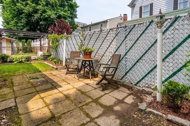 67 Gardner, Boston, MA 02132 - fenced backyard featuring a patio area
