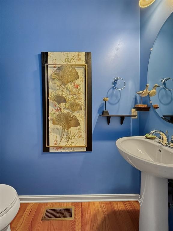 12 Grandview Dr Unit 12, Hopkinton, MA 01748 - bathroom featuring wood finished floors and toilet