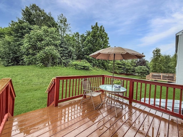 12 Grandview Dr Unit 12, Hopkinton, MA 01748 - wooden deck with a lawn and outdoor dining area