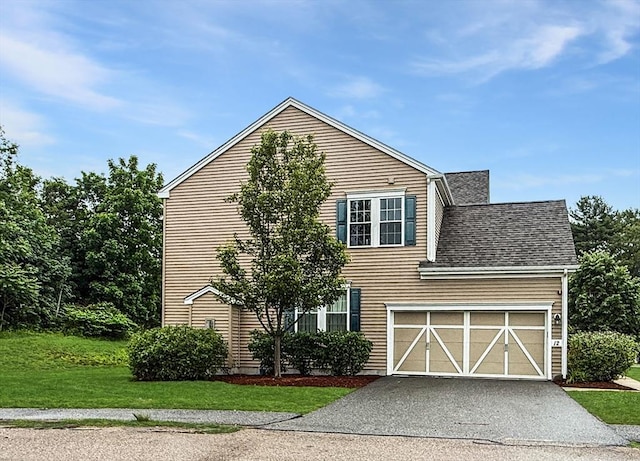 12 Grandview Dr Unit 12, Hopkinton, MA 01748 - view of front of property with driveway, a front yard, and roof with shingles