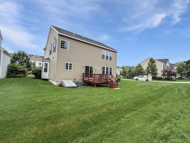 12 Grandview Dr Unit 12, Hopkinton, MA 01748 - rear view of property featuring a wooden deck and a lawn