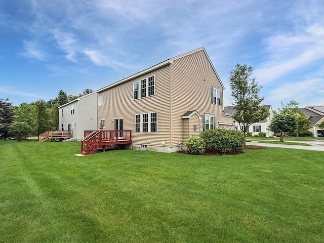 12 Grandview Dr Unit 12, Hopkinton, MA 01748 - rear view of property featuring a lawn and a wooden deck