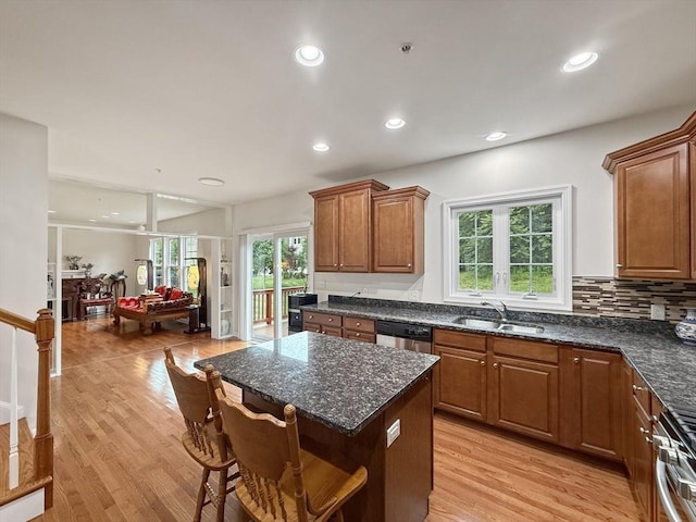 12 Grandview Dr Unit 12, Hopkinton, MA 01748 - kitchen with recessed lighting, light wood-type flooring, open floor plan, stainless steel appliances, and a breakfast bar