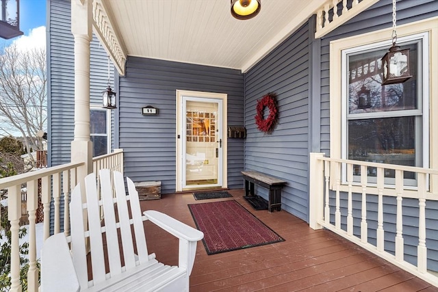 entrance to property with a porch