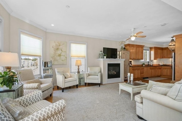 337-339 Gallivan Blvd Unit 2, Boston, MA 02124 - living room with crown molding, a glass covered fireplace, ceiling fan, and recessed lighting