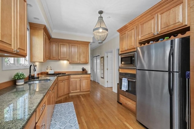 337-339 Gallivan Blvd Unit 2, Boston, MA 02124 - kitchen featuring appliances with stainless steel finishes, a sink, light wood-style flooring, crown molding, and light stone countertops