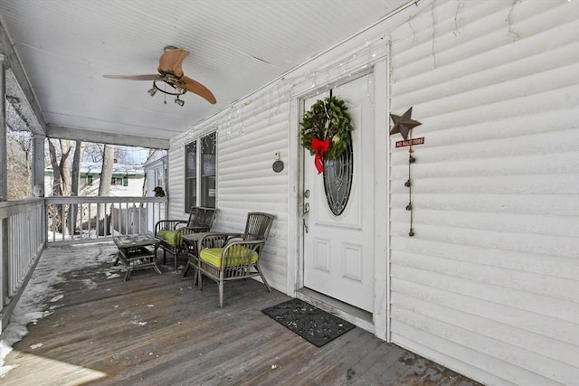 exterior space featuring a porch and ceiling fan