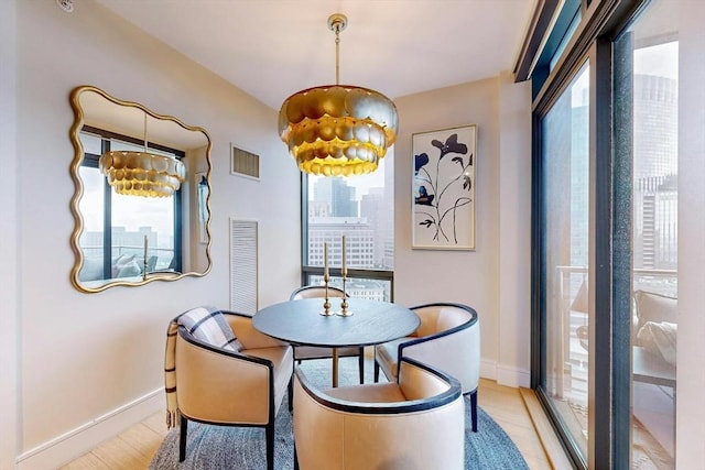 dining room featuring light wood-type flooring