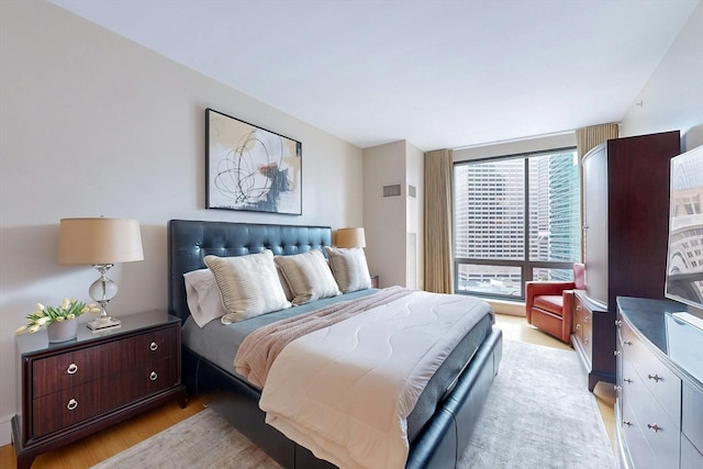 bedroom featuring light hardwood / wood-style flooring