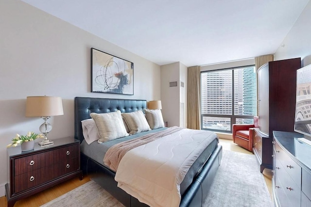 bedroom featuring light hardwood / wood-style floors