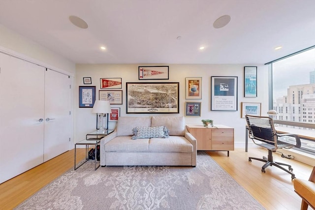 office area with light hardwood / wood-style flooring