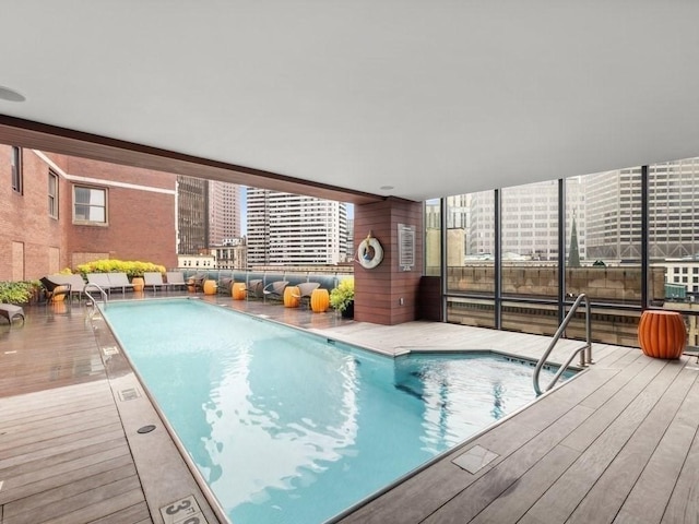 view of pool featuring a wooden deck