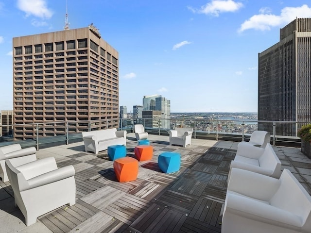 view of patio / terrace with a balcony and an outdoor living space