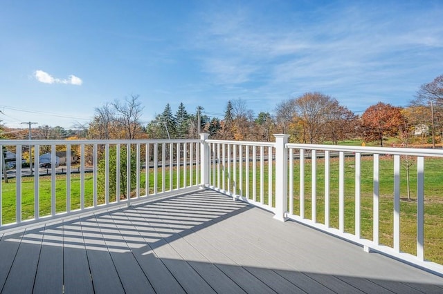 deck featuring a yard