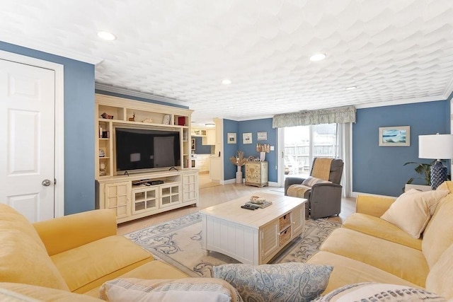 living room featuring baseboards, light wood-style floors, recessed lighting, and crown molding