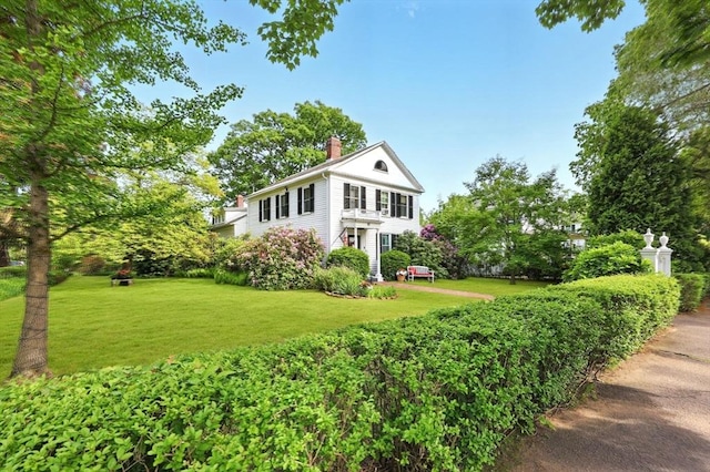 96 College St, South Hadley, MA 01075 - neoclassical home featuring a chimney and a front yard