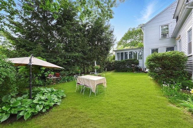 96 College St, South Hadley, MA 01075 - view of grassy yard with a sunroom
