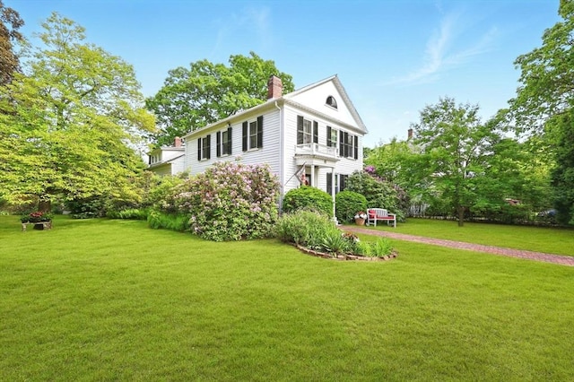 96 College St, South Hadley, MA 01075 - neoclassical home with a chimney and a front lawn