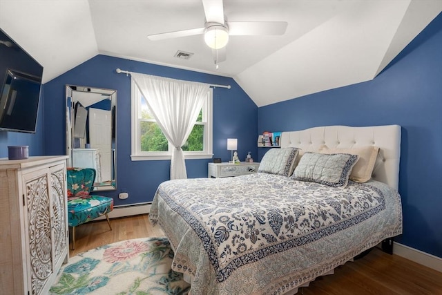 137 Pond, Westwood, MA 02090 - bedroom with vaulted ceiling, wood finished floors, a ceiling fan, baseboards, and a baseboard heating unit