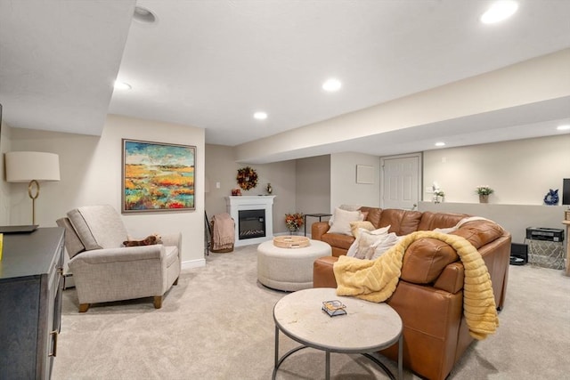 137 Pond, Westwood, MA 02090 - living area with light carpet, recessed lighting, a glass covered fireplace, and baseboards