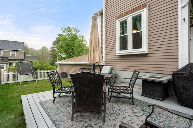 137 Pond, Westwood, MA 02090 - view of patio with a wooden deck and outdoor dining area