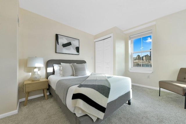 carpeted bedroom featuring a closet