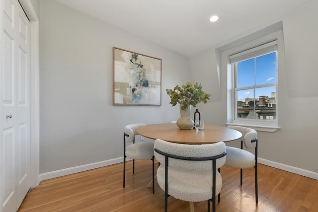 dining room with light hardwood / wood-style floors