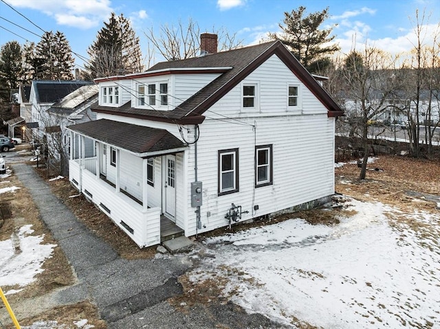 view of snow covered property