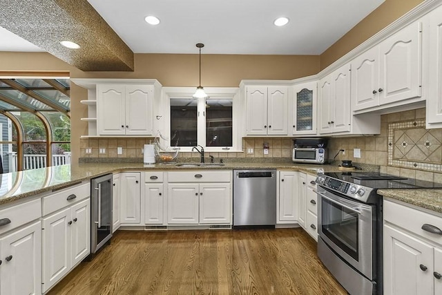 18 Village Hill Rd, Dover, MA 02030 - kitchen featuring appliances with stainless steel finishes, wine cooler, open shelves, a sink, and white cabinets