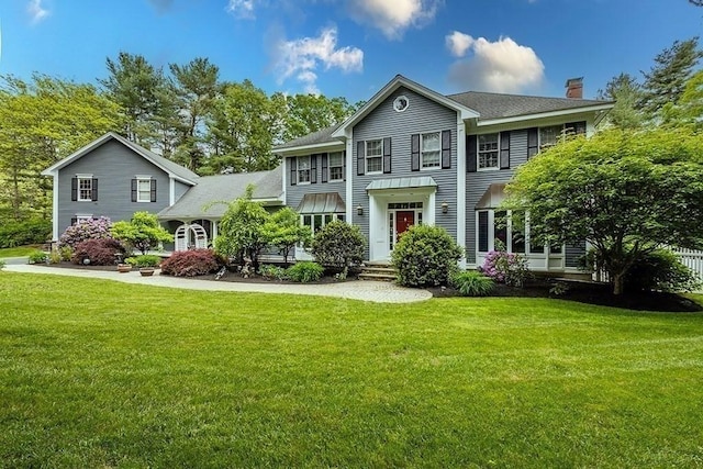 18 Village Hill Rd, Dover, MA 02030 - colonial inspired home featuring a front lawn, a chimney, and roof with shingles