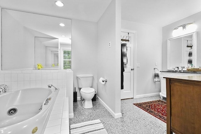 18 Village Hill Rd, Dover, MA 02030 - bathroom featuring baseboards, toilet, vanity, a whirlpool tub, and recessed lighting