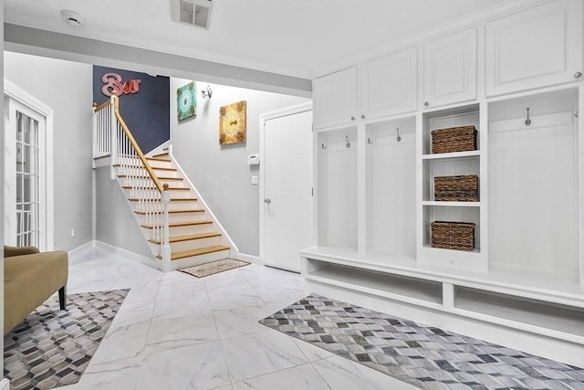 18 Village Hill Rd, Dover, MA 02030 - mudroom featuring light marble finish floors and baseboards