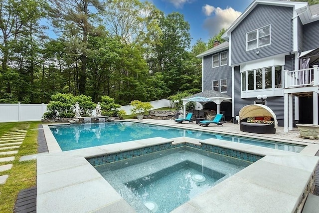 18 Village Hill Rd, Dover, MA 02030 - view of pool with a fenced backyard, a pool with connected hot tub, and a patio