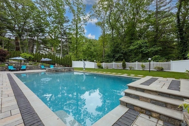 18 Village Hill Rd, Dover, MA 02030 - view of pool with a pool with connected hot tub, a patio area, and view of wooded area