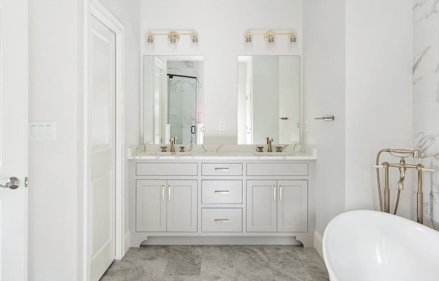 5 Bullens Way, Canton, MA 02021 - full bath featuring a shower stall, a freestanding tub, double vanity, marble finish flooring, and baseboards
