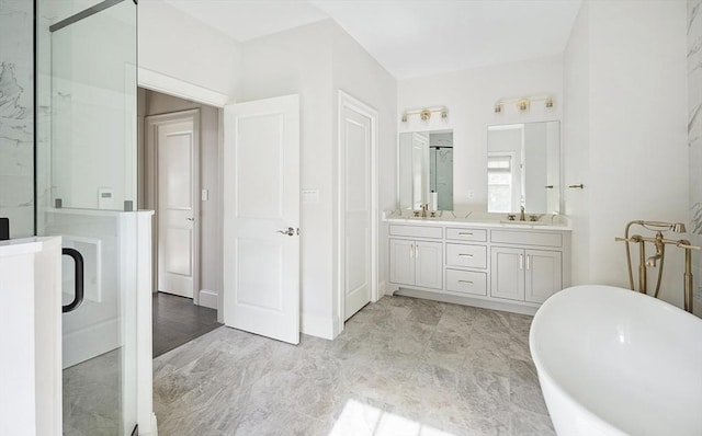5 Bullens Way, Canton, MA 02021 - full bathroom featuring a freestanding bath, double vanity, marble look tile flooring, and a shower with door